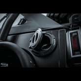 black jeep wrangler gas cap cover open on a black jeep